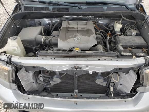 2010 Toyota Tundra Limited z VIN 5TFFY5F15AX098600, wystawiony jako Copart lot #66905195 z przebiegiem 205 694 mil mil oraz Szkoda całkowita • Salvage title. Historia ofert i sprzedaży dostępna na DreamBid. Obrazek 11.