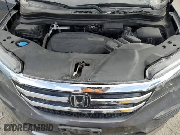 2016 Honda Pilot Touring с VIN 5FNYF5H97GB024700, выставлен на аукционе Copart как лот 69609785 с пробегом 141 846 миль миль и Списание • Salvage title. История ставок и продаж доступна на DreamBid. Изображение 12.