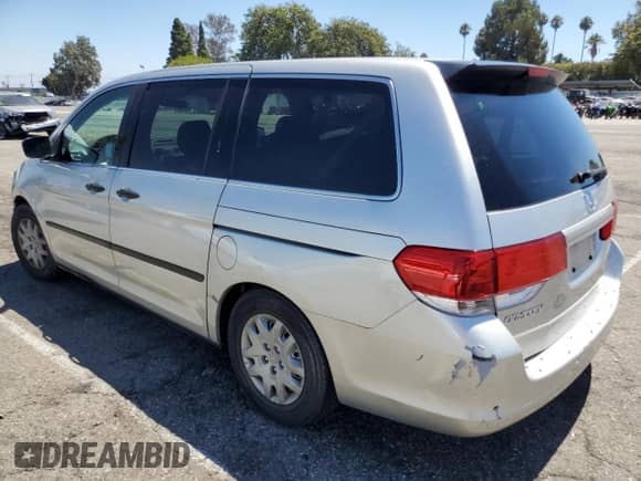 2009 Honda Odyssey LX с VIN 5FNRL38289B011221, выставлен на аукционе Copart как лот 69606165 с пробегом Не указан миль и Списание • Salvage title. История ставок и продаж доступна на DreamBid. Изображение 2.