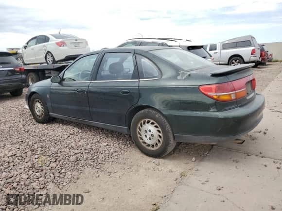 2000 Saturn LS with VIN 1G8JU52F1YY683714, listed as a Copart auction lot 69346334 with 231,845 mi miles and Salvage title. Bid and sale history available at DreamBid. Image 2.