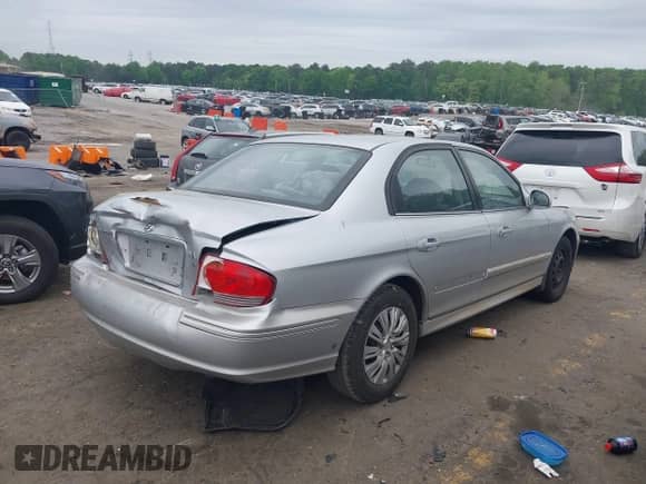 2003 Hyundai Sonata with VIN KMHWF25H23A858454, listed as a IAAI auction lot 42016877 with 135,539 mi miles and . Bid and sale history available at DreamBid. Image 4.