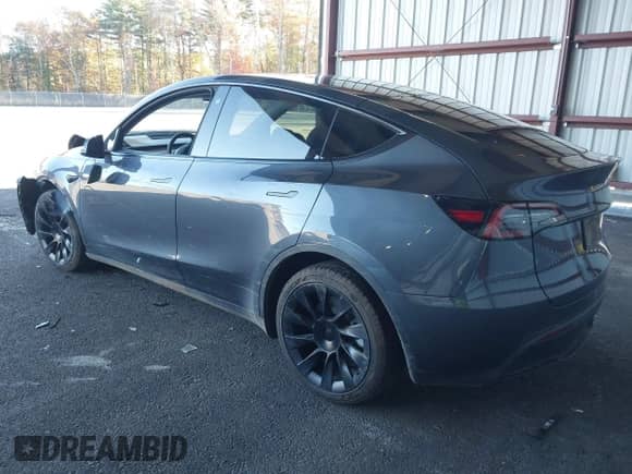 2022 Tesla Model Y Long Range z VIN 7SAYGDEE9NA010903, wystawiony jako IAAI lot #43397965 z przebiegiem 20 830 mil mil oraz . Historia ofert i sprzedaży dostępna na DreamBid. Obrazek 3.