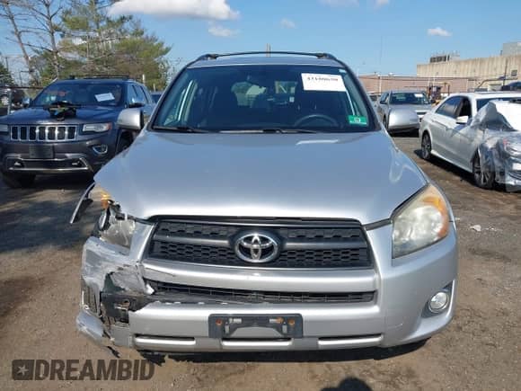2011 Toyota RAV4 Sport with VIN JTMRF4DV7B5037989, listed as a IAAI auction lot 43180630 with 122,013 mi miles and . Bid and sale history available at DreamBid. Image 12.
