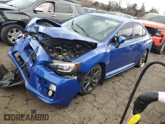 2016 Subaru WRX Limited with VIN JF1VA1J66G9809834, listed as a Copart auction lot 48798215 with 116,833 mi miles and Salvage title. Bid and sale history available at DreamBid. Image 1.