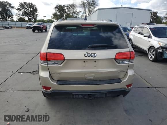2015 Jeep Grand Cherokee Altitude with VIN 1C4RJFAG6FC133856, listed as a Copart auction lot 81900825 with 186,596 mi miles and Salvage title. Bid and sale history available at DreamBid. Image 6.
