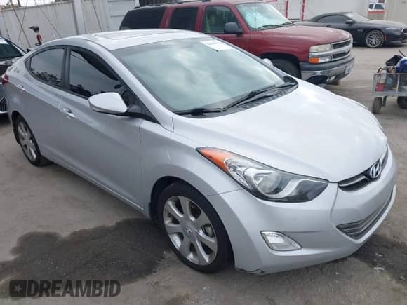 2013 Hyundai Elantra GLS z VIN KMHDH4AE6DU779474, wystawiony jako IAAI lot #42569044 z przebiegiem 95 106 mil mil oraz . Historia ofert i sprzedaży dostępna na DreamBid. Obrazek 1.
