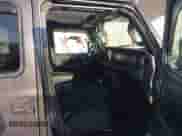 2022 Jeep Wrangler Unlimited Sport with VIN 1C4HJXDG5NW157317, listed as a IAAI auction lot 41374590 with 67,632 mi miles and . Bid and sale history available at DreamBid. Image 5.