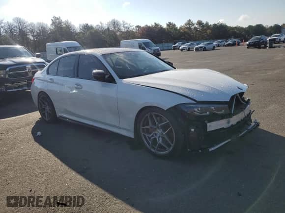 2022 BMW 3 Series M340i xDrive with VIN 3MW5U9J01N8C63539, listed as a Copart auction lot 71839485 with 29,319 mi miles and Salvage title. Bid and sale history available at DreamBid. Image 4.