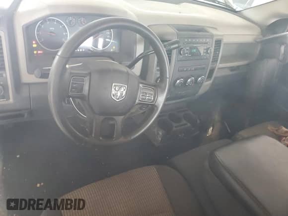 2012 Ram 1500 Express z VIN 1C6RD7FTXCS134228, wystawiony jako Copart lot #67399775 z przebiegiem 98 752 mil mil oraz Szkoda całkowita • Salvage title. Historia ofert i sprzedaży dostępna na DreamBid. Obrazek 8.