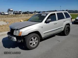 2008 Jeep Grand Cherokee Laredo with VIN 1J8HR48N58C206367, listed as a Copart auction lot 68304935 with 149,903 mi miles and Salvage title. Bid and sale history available at DreamBid. Image 1.