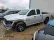 2014 Ram 1500 Tradesman with VIN 1C6RR7FG1ES204657, listed as a Copart auction lot 50946195 with 112,572 mi miles and Salvage title. Bid and sale history available at DreamBid. Image 1.