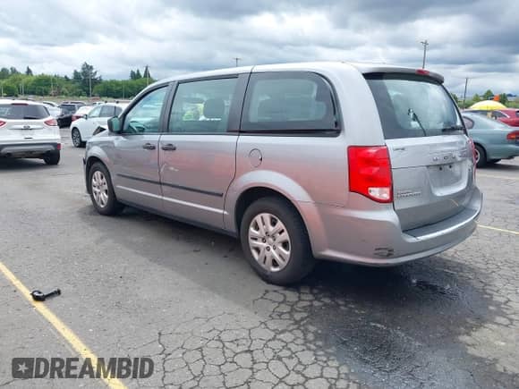 2016 Dodge Grand Caravan SE with VIN 2C4RDGBG9GR182599, listed as a IAAI auction lot 42431587 with 101,167 mi miles and . Bid and sale history available at DreamBid. Image 3.