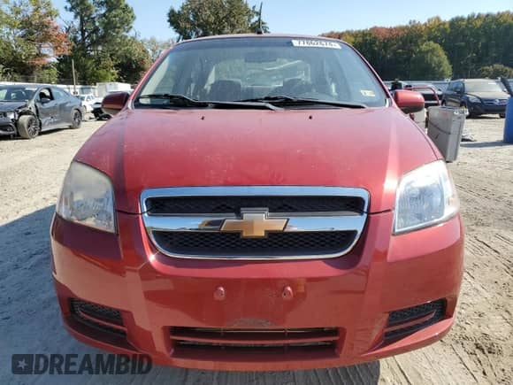 2011 Chevrolet Aveo 1LT z VIN KL1TD5DE5BB138149, wystawiony jako Copart lot #77862674 z przebiegiem 51 344 mil mil oraz Czysty tytuł • Clean title. Historia ofert i sprzedaży dostępna na DreamBid. Obrazek 5.