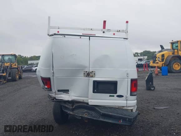 2013 Ford Econoline Cargo Commercial with VIN 1FTNE2EW7DDA65037, listed as a IAAI auction lot 43291990 with 233,281 mi miles and . Bid and sale history available at DreamBid. Image 16.