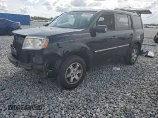 2011 Honda Pilot Touring with VIN 5FNYF3H9XBB029662, listed as a Copart auction lot 82096555 with 79,853 mi miles and Salvage title. Bid and sale history available at DreamBid. Image 1.