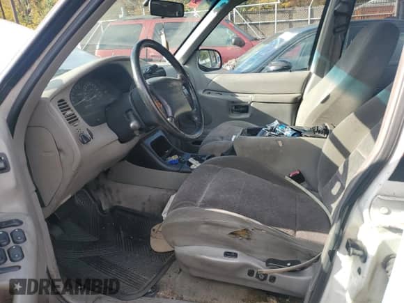 1998 Ford Explorer XLT with VIN 1FMZU35P6WZB60144, listed as a Copart auction lot 90896645 with Not provided miles and Salvage title. Bid and sale history available at DreamBid. Image 7.