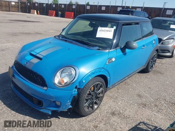 2012 MINI Hardtop S with VIN WMWSV3C55CTY29181, listed as a IAAI auction lot 42621045 with 68,706 mi miles and . Bid and sale history available at DreamBid. Image 2.
