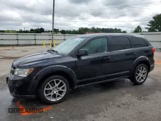 2013 Dodge Journey R/T Rallye with VIN 3C4PDDEG2DT591943, listed as a Copart auction lot 65811805 with 132,731 mi miles and Salvage title. Bid and sale history available at DreamBid. Image 1.