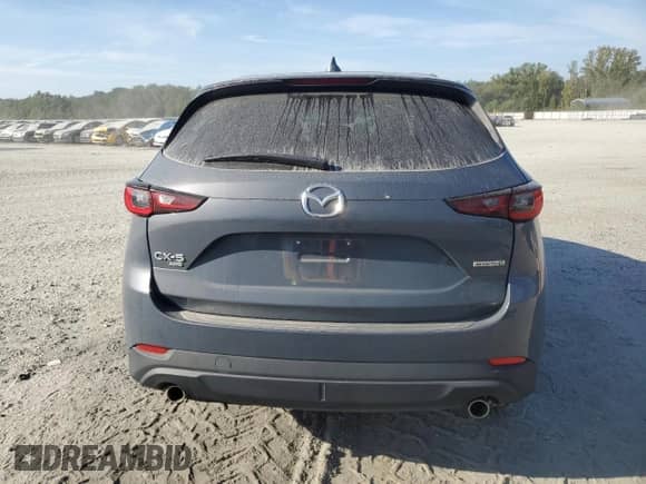 2023 Mazda CX-5 S Carbon Edition с VIN JM3KFBCM6P0179020, выставлен на аукционе Copart как лот 70706485 с пробегом 30 675 миль миль и Списание • Salvage title. История ставок и продаж доступна на DreamBid. Изображение 6.