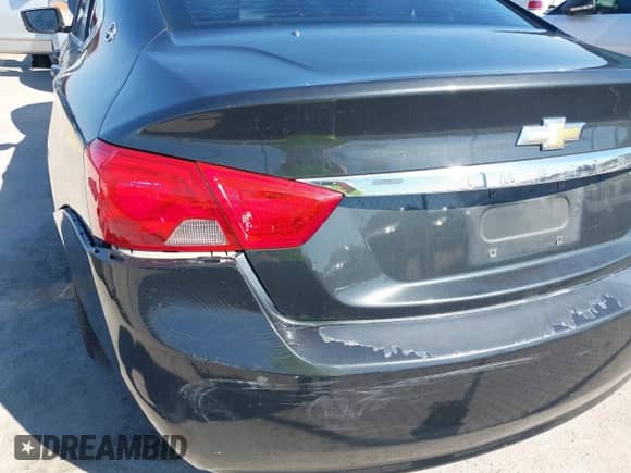 2014 Chevrolet Impala LT z VIN 1G1115SLXEU166556, wystawiony jako IAAI lot #43386361 z przebiegiem 109 076 mil mil oraz . Historia ofert i sprzedaży dostępna na DreamBid. Obrazek 13.