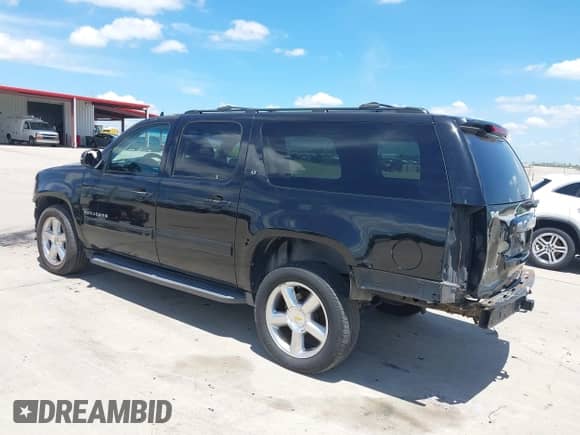 2013 Chevrolet Suburban LT with VIN 1GNSKJE71DR168382, listed as a IAAI auction lot 42821206 with 209,210 mi miles and . Bid and sale history available at DreamBid. Image 3.