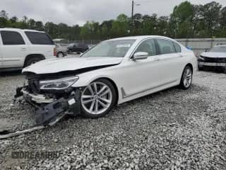 2018 BMW 7 Series 750i with VIN WBA7F0C53JGM22614, listed as a Copart auction lot 51787515 with Not provided miles and Salvage title. Bid and sale history available at DreamBid. Image 1.