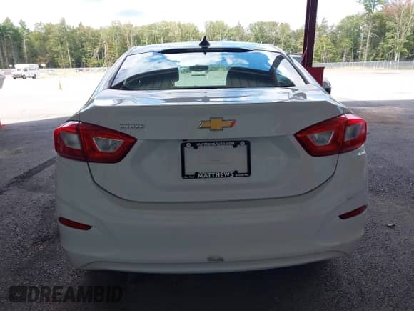 2017 Chevrolet Cruze LS z VIN 1G1BC5SM6H7181842, wystawiony jako IAAI lot #43134836 z przebiegiem 119 951 mil mil oraz . Historia ofert i sprzedaży dostępna na DreamBid. Obrazek 16.