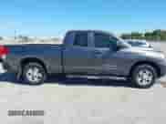 2012 Toyota Tundra z VIN 5TFRU5F19CX026861, wystawiony jako IAAI lot #41827542 z przebiegiem 135 428 mil mil oraz . Historia ofert i sprzedaży dostępna na DreamBid. Obrazek 13.