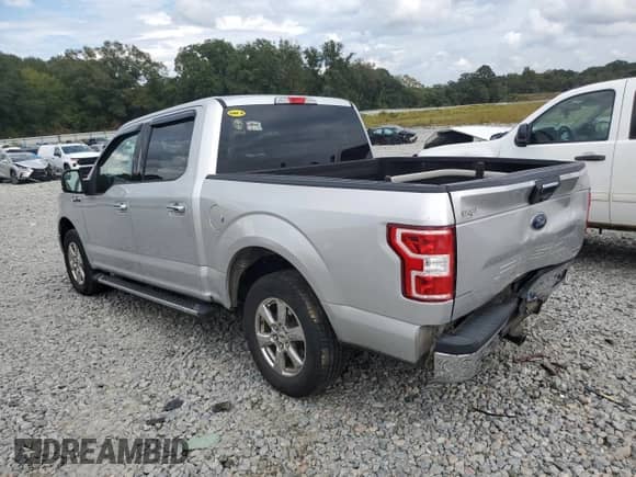 2018 Ford F-150 XL z VIN 1FTEW1CP5JFD31349, wystawiony jako Copart lot #85582915 z przebiegiem 96 674 mil mil oraz Szkoda całkowita • Salvage title. Historia ofert i sprzedaży dostępna na DreamBid. Obrazek 2.