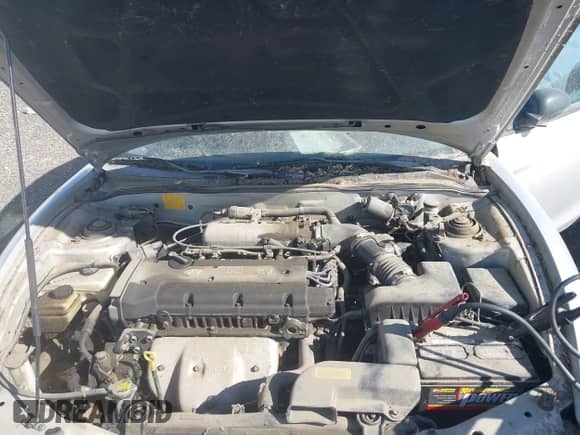 2001 Hyundai Tiburon z VIN KMHJG25F21U252699, wystawiony jako IAAI lot #43022128 z przebiegiem 72 837 mil mil oraz . Historia ofert i sprzedaży dostępna na DreamBid. Obrazek 10.
