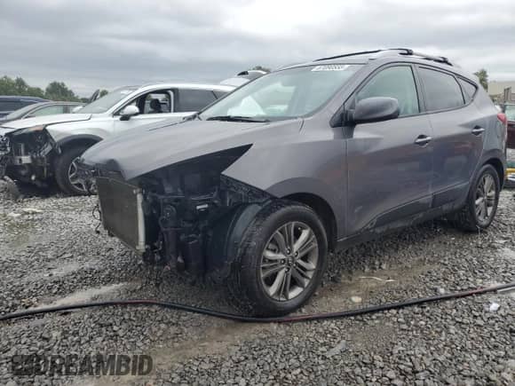 2015 Hyundai Tucson SE z VIN KM8JUCAG5FU989285, wystawiony jako Copart lot #67090555 z przebiegiem 120 618 mil mil oraz Szkoda całkowita • Salvage title. Historia ofert i sprzedaży dostępna na DreamBid. Obrazek 1.