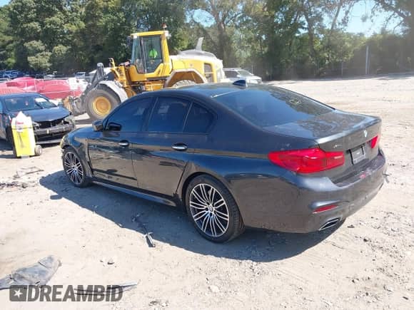 2017 BMW 5 Series 530i xDrive with VIN WBAJA7C35HG457970, listed as a IAAI auction lot 43197875 with 84,885 mi miles and . Bid and sale history available at DreamBid. Image 3.