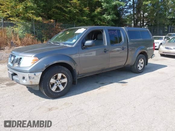 2009 Nissan Frontier SE with VIN 1N6AD09WX9C401340, listed as a IAAI auction lot 43170418 with 212,858 mi miles and . Bid and sale history available at DreamBid. Image 2.
