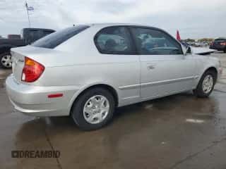 2005 Hyundai Accent GLS с VIN KMHCG35C45U329244, выставлен на аукционе Copart как лот 82548424 с пробегом 81 191 миль миль и Чистый • Clean title. История ставок и продаж доступна на DreamBid. Изображение 3.