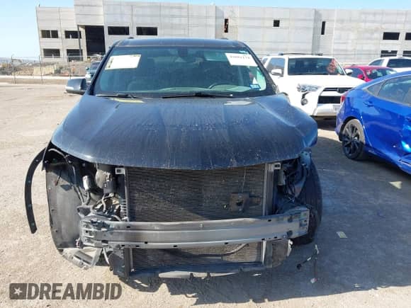 2020 Chevrolet Traverse LT Cloth z VIN 1GNERGKW1LJ317717, wystawiony jako IAAI lot #42681174 z przebiegiem 100 517 mil mil oraz . Historia ofert i sprzedaży dostępna na DreamBid. Obrazek 12.