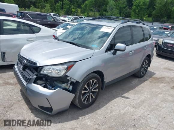 2018 Subaru Forester Premium with VIN JF2SJGEC1JH505082, listed as a IAAI auction lot 42525067 with 86,186 mi miles and . Bid and sale history available at DreamBid. Image 18.