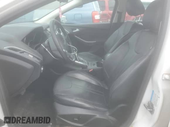 2013 Ford Focus Titanium with VIN 1FADP3N27DL120834, listed as a Copart auction lot 68762965 with 171,855 mi miles and Salvage title. Bid and sale history available at DreamBid. Image 7.