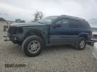 2002 Jeep Grand Cherokee Laredo with VIN 1J8GW48S22C315676, listed as a Copart auction lot 81440405 with 125,844 mi miles and Salvage title. Bid and sale history available at DreamBid. Image 1.