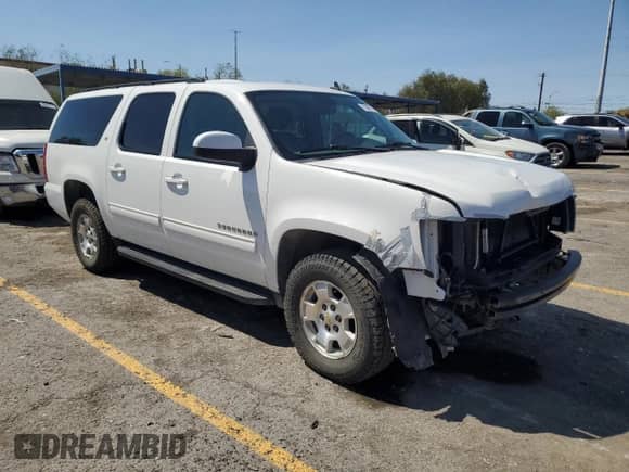 2014 Chevrolet Suburban LT с VIN 1GNSKJE74ER210948, выставлен на аукционе Copart как лот 70897705 с пробегом 257 668 миль миль и Списание • Salvage title. История ставок и продаж доступна на DreamBid. Изображение 4.