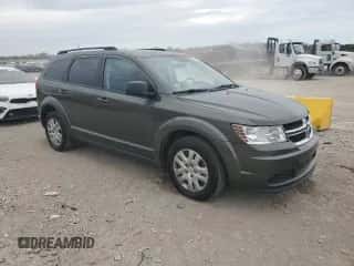2018 Dodge Journey SE with VIN 3C4PDCAB7JT229476, listed as a Copart auction lot 86487225 with 148,312 mi miles and Clean title. Bid and sale history available at DreamBid. Image 4.
