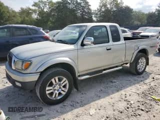 2003 Toyota Tacoma z VIN 5TEWN72N73Z233505, wystawiony jako Copart lot #80916175 z przebiegiem 227 346 mil mil oraz Czysty tytuł • Clean title. Historia ofert i sprzedaży dostępna na DreamBid. Obrazek 1.