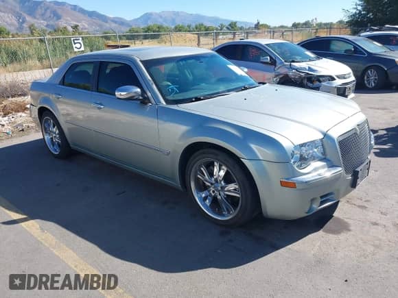 2005 Chrysler 300 C with VIN 2C3JA63H45H522482, listed as a IAAI auction lot 43295388 with 164,640 mi miles and . Bid and sale history available at DreamBid. Image 1.