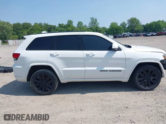 2020 Jeep Grand Cherokee Altitude with VIN 1C4RJFAG9LC196252, listed as a IAAI auction lot 42413963 with 100,856 mi miles and . Bid and sale history available at DreamBid. Image 13.