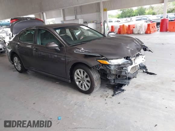 2019 Toyota Camry SE z VIN 4T1B11HK8KU763229, wystawiony jako IAAI lot #43320855 z przebiegiem 99 256 mil mil oraz . Historia ofert i sprzedaży dostępna na DreamBid. Obrazek 1.