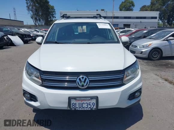 2015 Volkswagen Tiguan S with VIN WVGAV7AX0FW608144, listed as a IAAI auction lot 42760864 with 162,679 mi miles and . Bid and sale history available at DreamBid. Image 12.