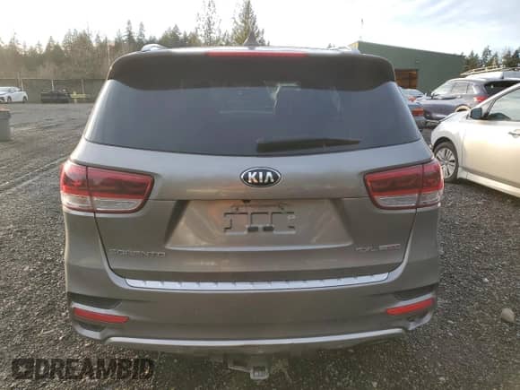 2016 Kia Sorento SXL with VIN 5XYPKDA16GG001293, listed as a Copart auction lot 85128944 with 121,180 mi miles and Salvage title. Bid and sale history available at DreamBid. Image 6.