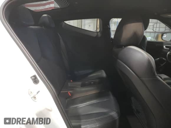 2016 Hyundai Veloster Turbo с VIN KMHTC6AE7GU283559, выставлен на аукционе Copart как лот 61600565 с пробегом Не указан миль и Списание • Salvage title. История ставок и продаж доступна на DreamBid. Изображение 11.