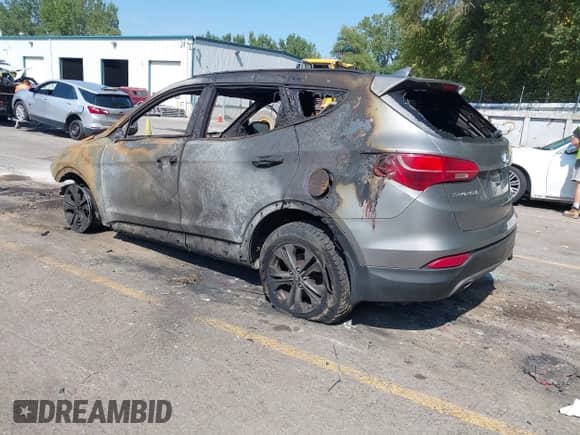 2014 Hyundai Santa Fe с VIN 5XYZUDLBXEG185949, выставлен на аукционе IAAI как лот 43249188 с пробегом Не указан миль и . История ставок и продаж доступна на DreamBid. Изображение 3.