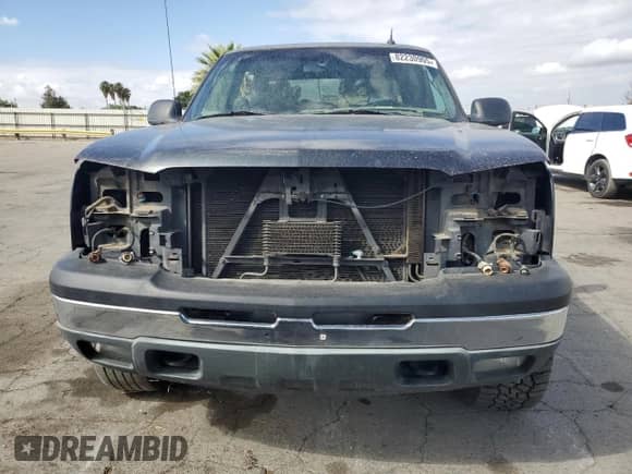 2005 Chevrolet Silverado 1500 LS z VIN 2GCEC13T151338673, wystawiony jako Copart lot #82230905 z przebiegiem Nie podano mil oraz Szkoda całkowita • Salvage title. Historia ofert i sprzedaży dostępna na DreamBid. Obrazek 5.