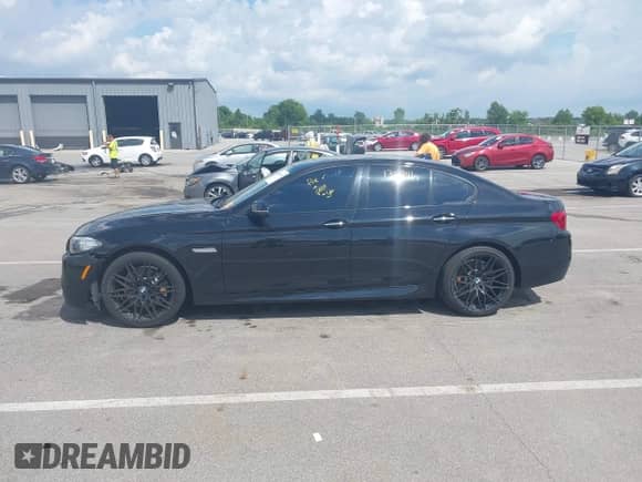2015 BMW 5 Series 535i xDrive with VIN WBA5B3C50FD541055, listed as a IAAI auction lot 42845615 with 136,941 mi miles and . Bid and sale history available at DreamBid. Image 14.